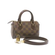 Pre-owned Brunt lerret Louis Vuitton Speedy