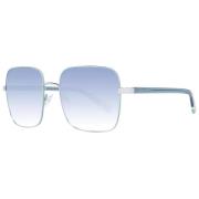 Stilige firkantede solbriller med sølvfarget ramme og blå linser