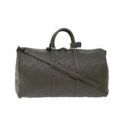 Pre-owned Grønt lerret Louis Vuitton Keepall