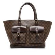 Pre-owned Brunt skinn Louis Vuitton Manosque