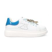 Hvite skinn slip-on sneakers med rhinestone detalj