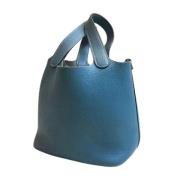 Pre-owned Fabric handbags