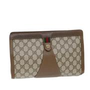 Pre-owned Canvas clutches