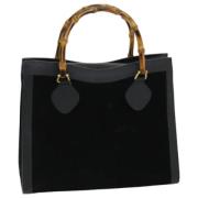 Pre-owned Suede handbags