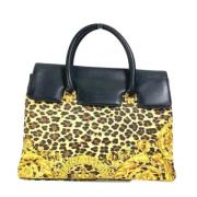 Pre-owned Fabric handbags