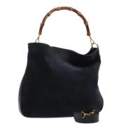 Pre-owned Suede handbags