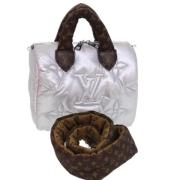 Pre-owned Fabric handbags