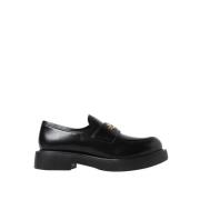 Sorte skinnloafers med gulllogo