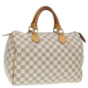 Pre-owned Fabric handbags