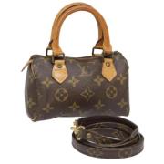 Pre-owned Fabric handbags