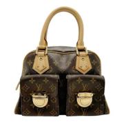 Pre-owned Fabric handbags