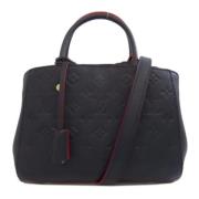 Pre-owned Canvas handbags