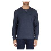 Sweatshirt i bomullsblanding med frontlogo-patch