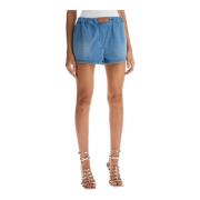 Avslappet passform denim shorts