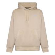 Beige hettegenser med brodert logo